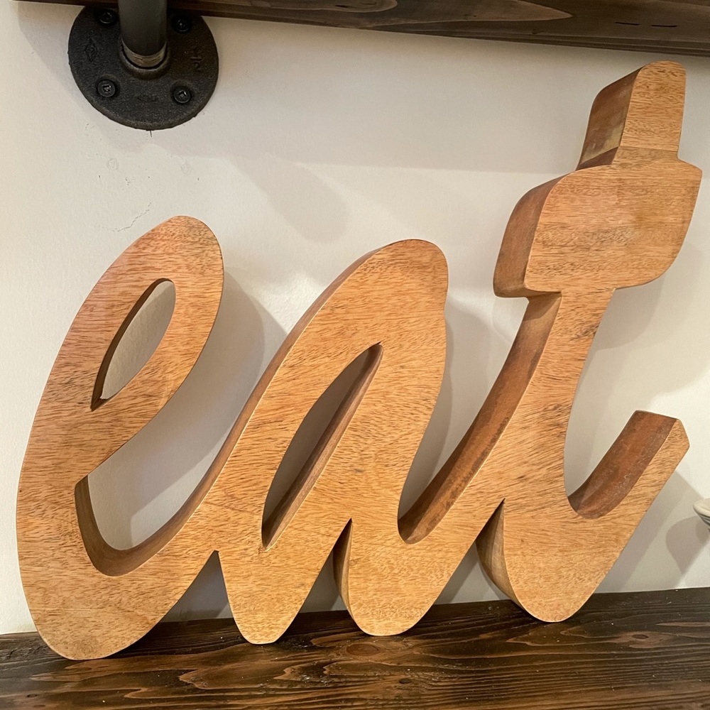 Wood “eat” Sign